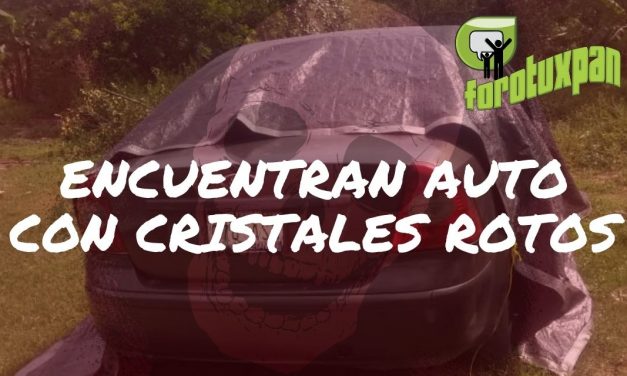 ENCUENTRAN AUTO CON CRISTALES ROTOS