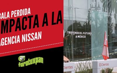 BALA PERDIDA IMPACTA A LA AGENCIA NISSAN