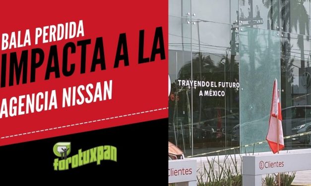 BALA PERDIDA IMPACTA A LA AGENCIA NISSAN