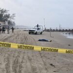 Policía de Ecatepec muere ahogado en playa Amistad; su acompañante fue rescatada con vida