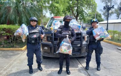 Asociación Ganadera de Tuxpan reconoce a policías con entrega de despensas en su día